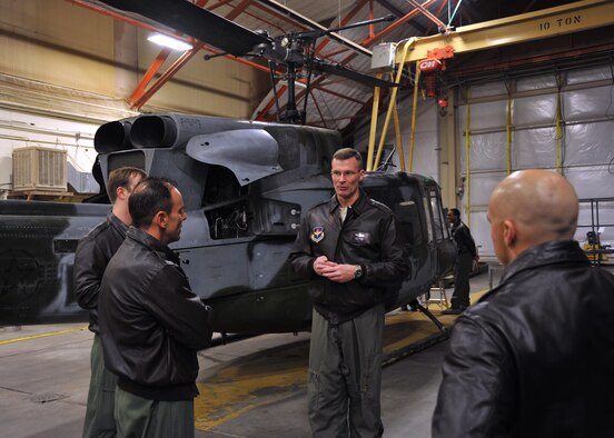 Lt. Col. Mike Thomas, 58th Training Squadron commander, briefs members of the 53rd Weather Reconnaissance Squadron, part of the 403rd Wing at Keesler Air Force Base, Mississippi, during a tour of a training facility at the 58th Special Operation Wing’s 58th TRS C-130J Center of Excellence at Kirtland Air Force Base, New Mexico, Jan. 13, 2015. The Hurricane Hunters are considering sending their navigators to the training center for their initial and mission qualification training on the C-130J. (U.S. Air Force photo/Maj. Marnee A.C. Losurdo)