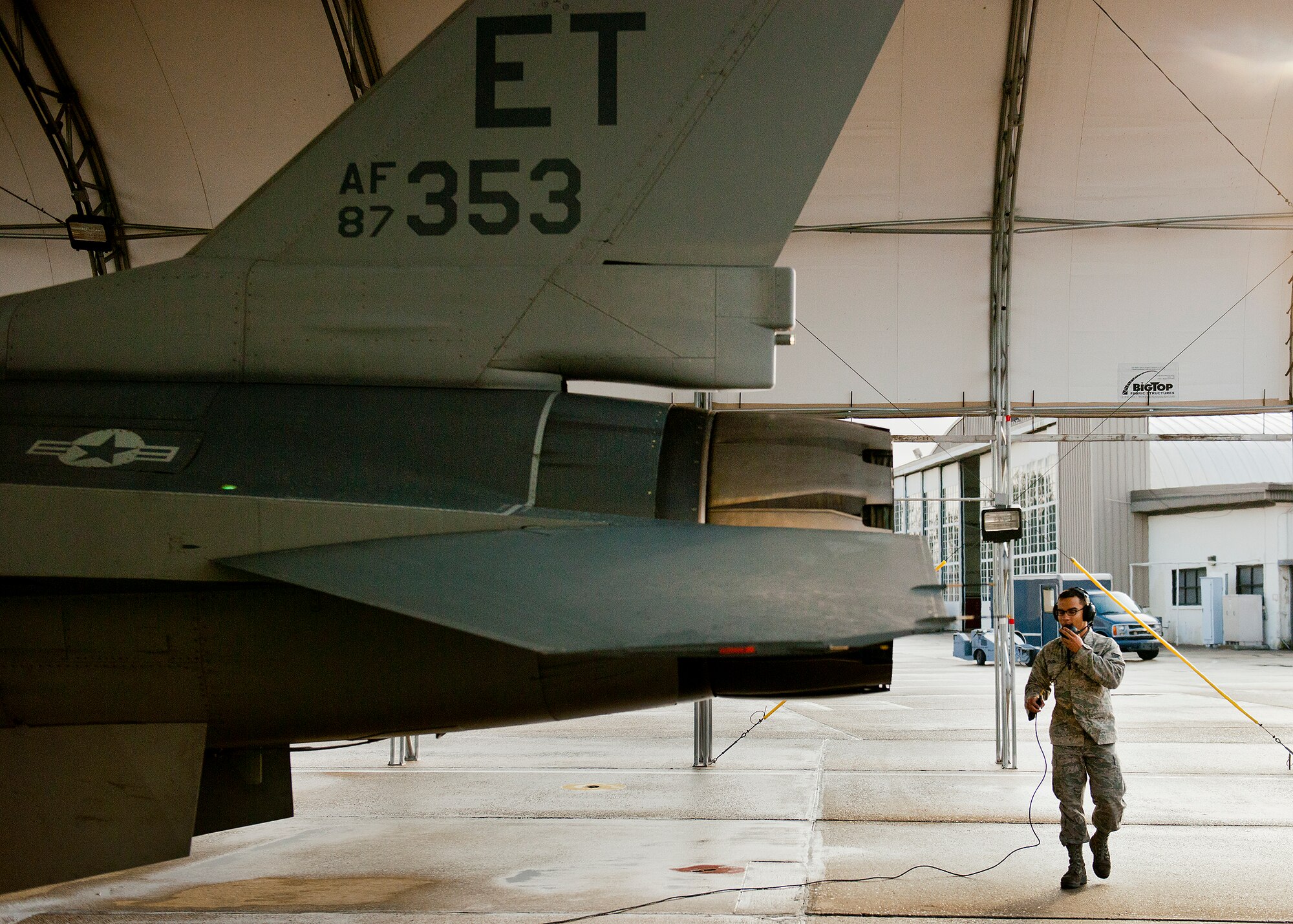 Senior Airman Roderick Ponton, a 96th Aircraft Maintenance Squadron crew chief, performs a preflight check on his F-16 Fighting Falcon prior to a morning sortie at Eglin Air Force Base, Fla.  The 96th AMXS is responsible for the maintenance of all the test aircraft for the 96th Test Wing and the 85th Test and Evaluation Squadron.  (U.S. Air Force photo/Samuel King Jr.)