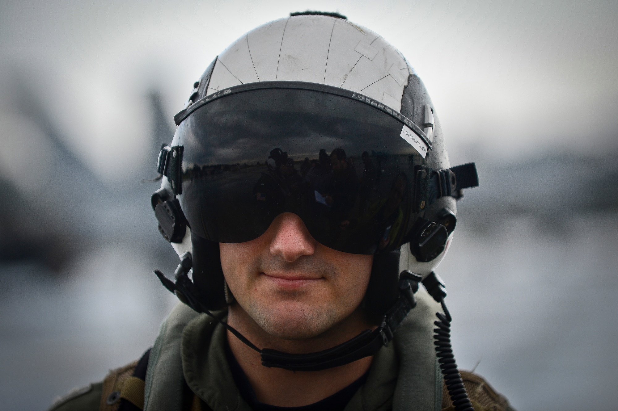 A Navy pilot with the VFA-106 is interviewed from local media agencies after a training flight in the F-18 Superhornet at MacDill Air Force Base, Fla., Jan. 9, 2015. More than 180 personnel from Oceana Naval Air Station, Va., came to MacDill for a Navy Training Exercise. (U.S. Air Force photo by Senior Airman Ned T. Johnston/Released)