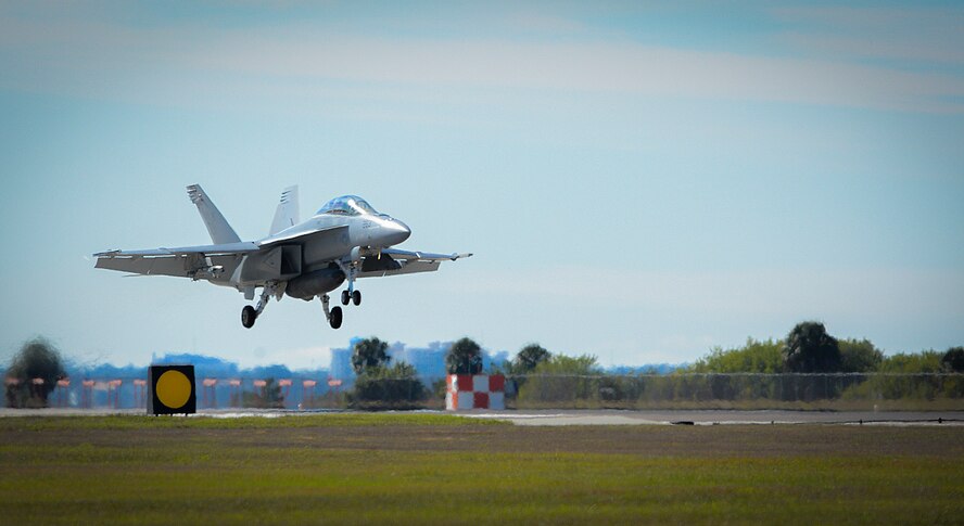 A Navy F-18 Super Hornet lands during a training mission held at MacDill Air Force Base, Fla., Jan. 12, 2015. Eighteen Hornets and Super Hornets participated in a VFA-106 Navy Training Exercise that instructed the fleet’s newest aviators on air-to-ground operations.  (U.S. Air Force photo by Tech. Sgt. Brandon Shapiro/Released)