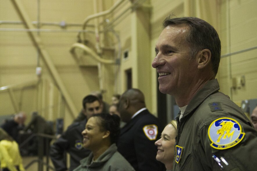 U.S. Air Force Maj. Gen. Michael Keltz, 19th Air Force commander, watches civic leaders pilot A-29 Super Tucano simulators Jan. 15, 2015, at Moody Air Force Base, Ga. The 81st Fighter Squadron, home of the A-29 Afghan training and maintenance mission, plans to train 30 Afghan air force officers to pilot the A-29. (U.S. Air Force photo by Airman 1st Class Dillian Bamman/Released)