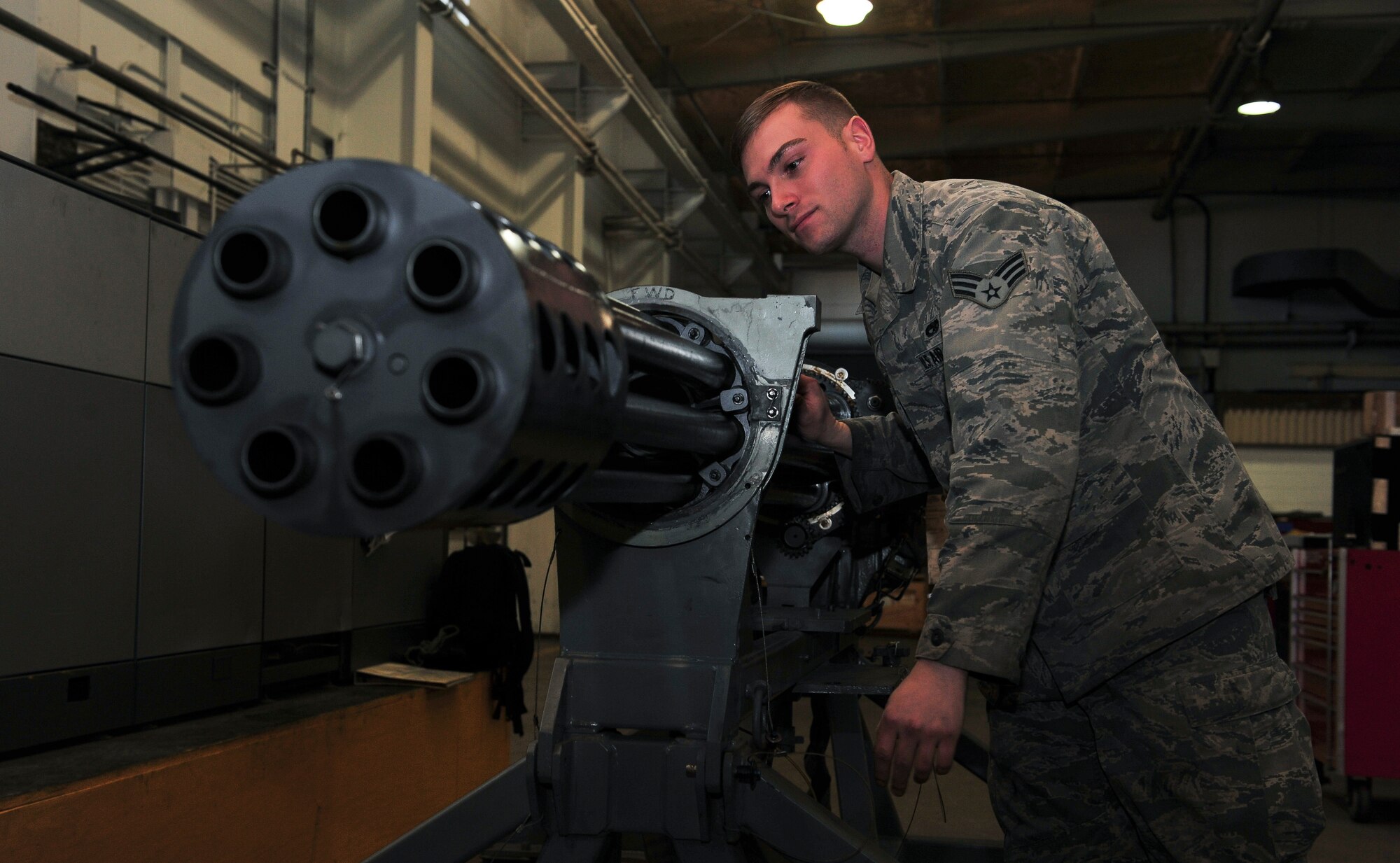 Senior Airman Ethan Halbert, 51st Munitions Squadron A-10 combat armament support team member, inspects a GAU-8 gun after repairing parts of the weapons Jan. 6, 2014, at Osan Air Base, Republic of Korea. Halbert is this week’s Airman Spotlight. (U.S. Air Force photo by Senior Airman David Owsianka)