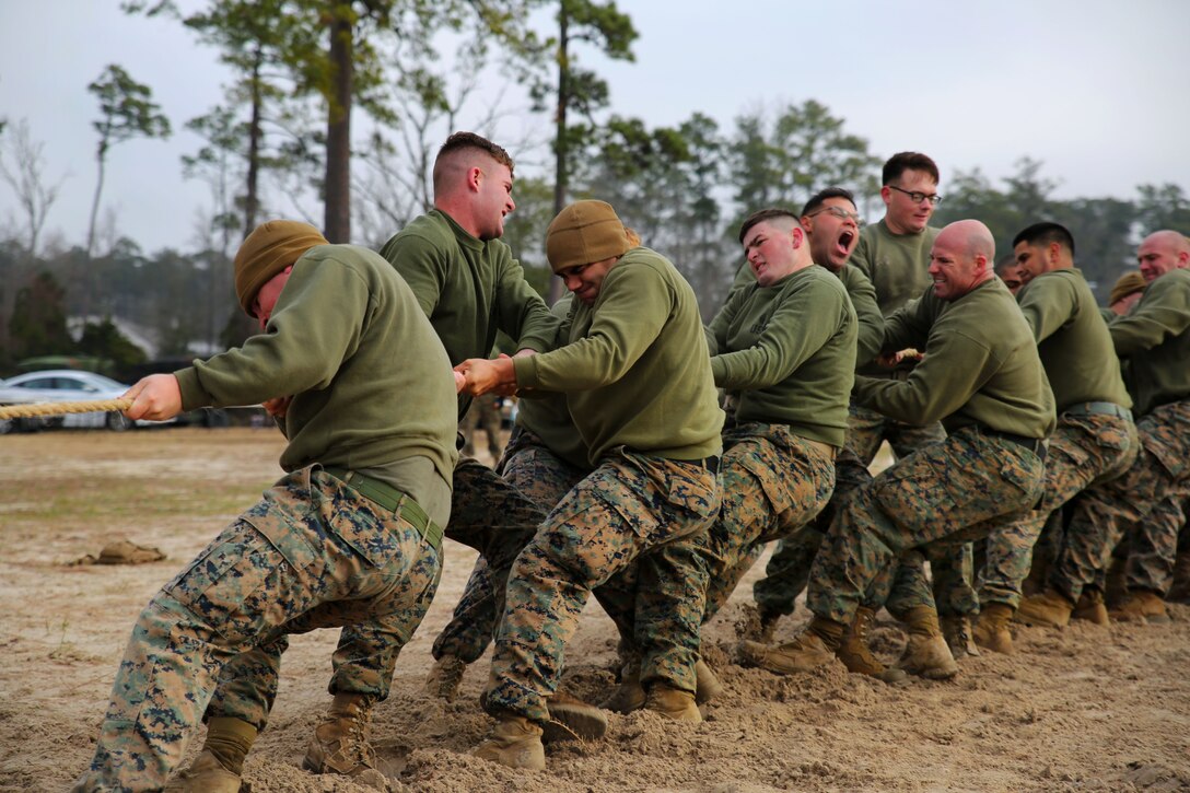 Marines participate in a tug-of-war while competing in the Gladiator Games on Camp Lejeune, N.C., Jan. 15, 2015. The Marines are assigned to the 2nd Battalion, 8th Marine Regiment, 2nd Marine Division. The battalion holds the games once or twice a year to bolster morale and increase unit cohesion. The games consist of a 7-ton pull, fire-man carry relay, grappling, tug-of-war, tire flipping, and more. The best company at the Gladiator Games wins the unit's gladiator helmet. 