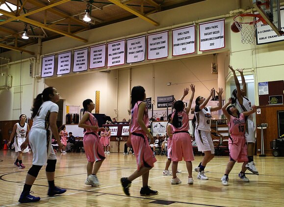 The Lady Samurai of Matthew C. Perry High School’s basketball team score against the Lady Hydrangeas of the Tabuse Agricultural Technical High School basketball team on Jan. 18, 2015 at the high school gymnasium aboard Marine Corps Air Station Iwakuni, Japan. The Lady Samurai lost the game with a score of 24-47 and pushing forward to increase their number of wins as they stand with a 4-7 game season.
 
