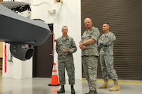 General Craig R. McKinley, chief of the National Guard Bureau, meets with instructors at the 174th Fighter Wing's Field Training Detachment, which trains all MQ-9 Reaper maintenance personnel to perform various maintenance functions. The detachment is responsible for training all Air Force components: active duty Air Force, Air National Guard and Air Force Reserve personne