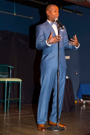 Daniel Dugar, a comedian, entertains attendees of the B4 They Made You Laugh III Marin Luther King Weekend tour hosted by Armed Forces Entertainment aboard Marine Corps Air Station Iwakuni, Japan, Jan. 16, 2015. Visiting comedians included Gary Owens, Rodney Perry and Dugar.
