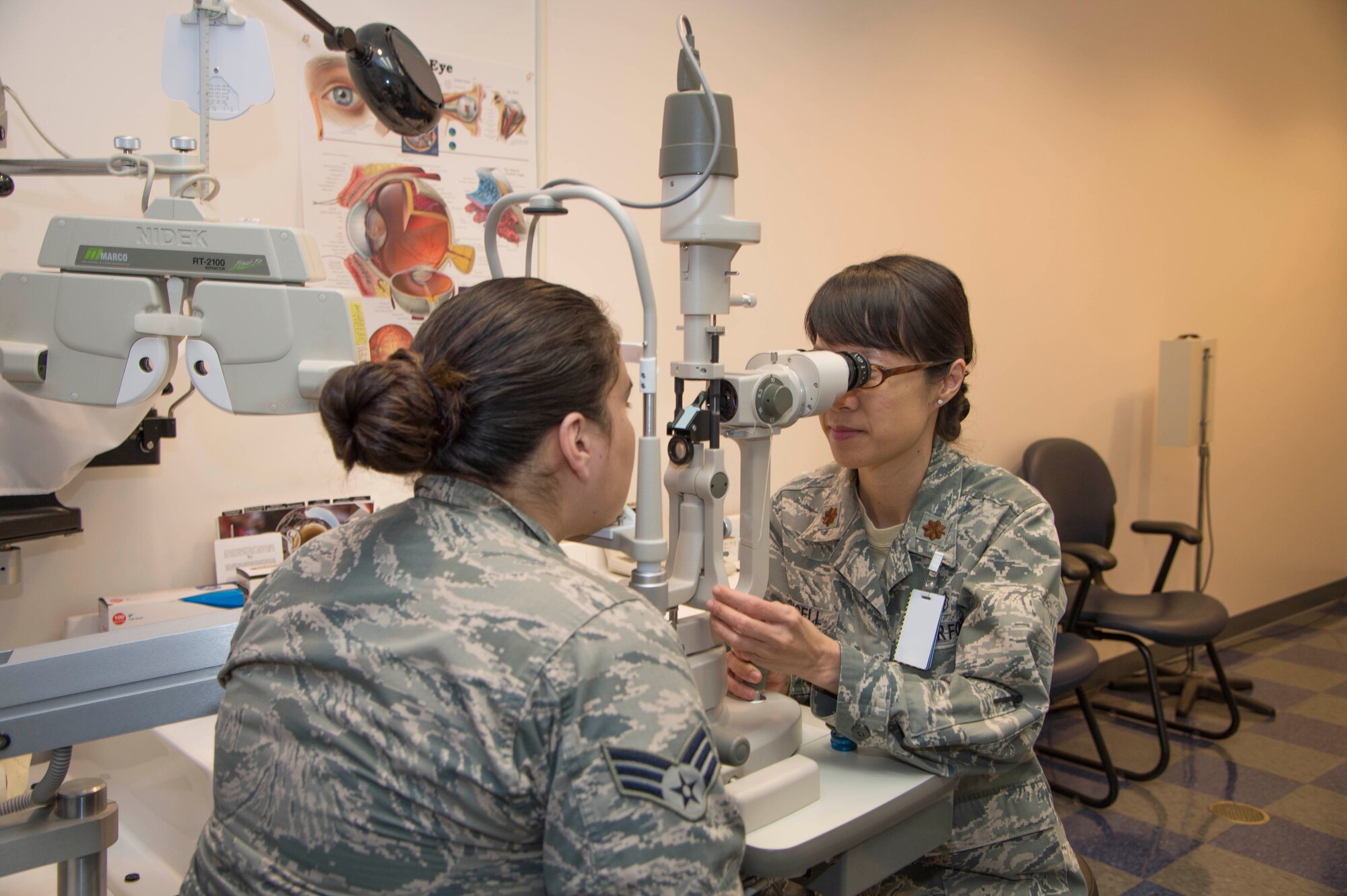 The Biomedical Sciences Corps is made up of 2,400 professionals in a range of fields including optometry. Maj. Jade Texcell is shown providing an optometry exam to an Airman. (U.S. Air Force photo by Ethan Wagner)