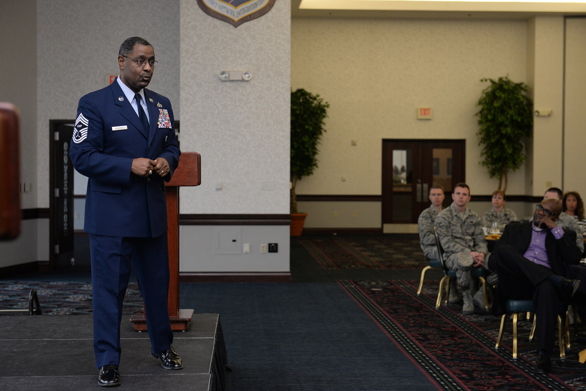 Scott AFB hosted a Martin Luther King, Jr. luncheon at the Club, to share the importance of the day and the man behind it, Jan. 14, 2015. Guest speakers included retired Chief Master Sgt. Robert Dandridge, Civil Air Patrol, and 1st Lt. Jonathan Davis, who spoke about how King affected them throughout their life. (U.S. Air Force photos by A1C Erica Crossen)