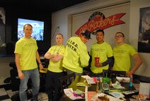 Members of Airmen Against Drunk Driving pose for a group photo during Super Base Extravaganza activities Jan. 17, 2015, at the Northern Lights Club at Grand Forks Air Force Base, N.D. A total of six Airmen volunteered to be designated drivers this year’s SBE. AADD members serve as designated drivers for people who may have consumed too much alcohol and are impaired to operate a vehicle. (U.S. Air Force photo/Staff Sgt. Luis Loza Gutierrez)