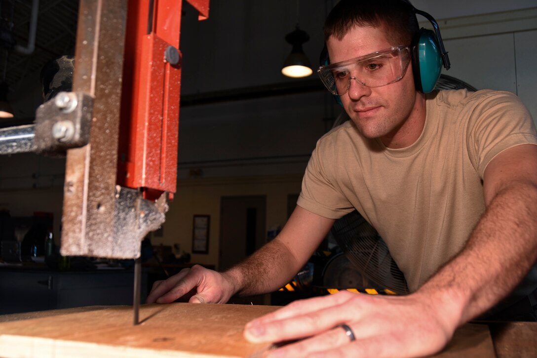 Senior Airman Christian Scott, 911th Civil Engineering Squadron structure specialist, uses his passion for carpentry and job skills to help him excel in his job in the Air Force Reserve, which is building and maintaining infrastructure such as buildings, stairs and handicap ramps. (U.S. Air Force photo by Senior Airman Joshua J. Seybert)