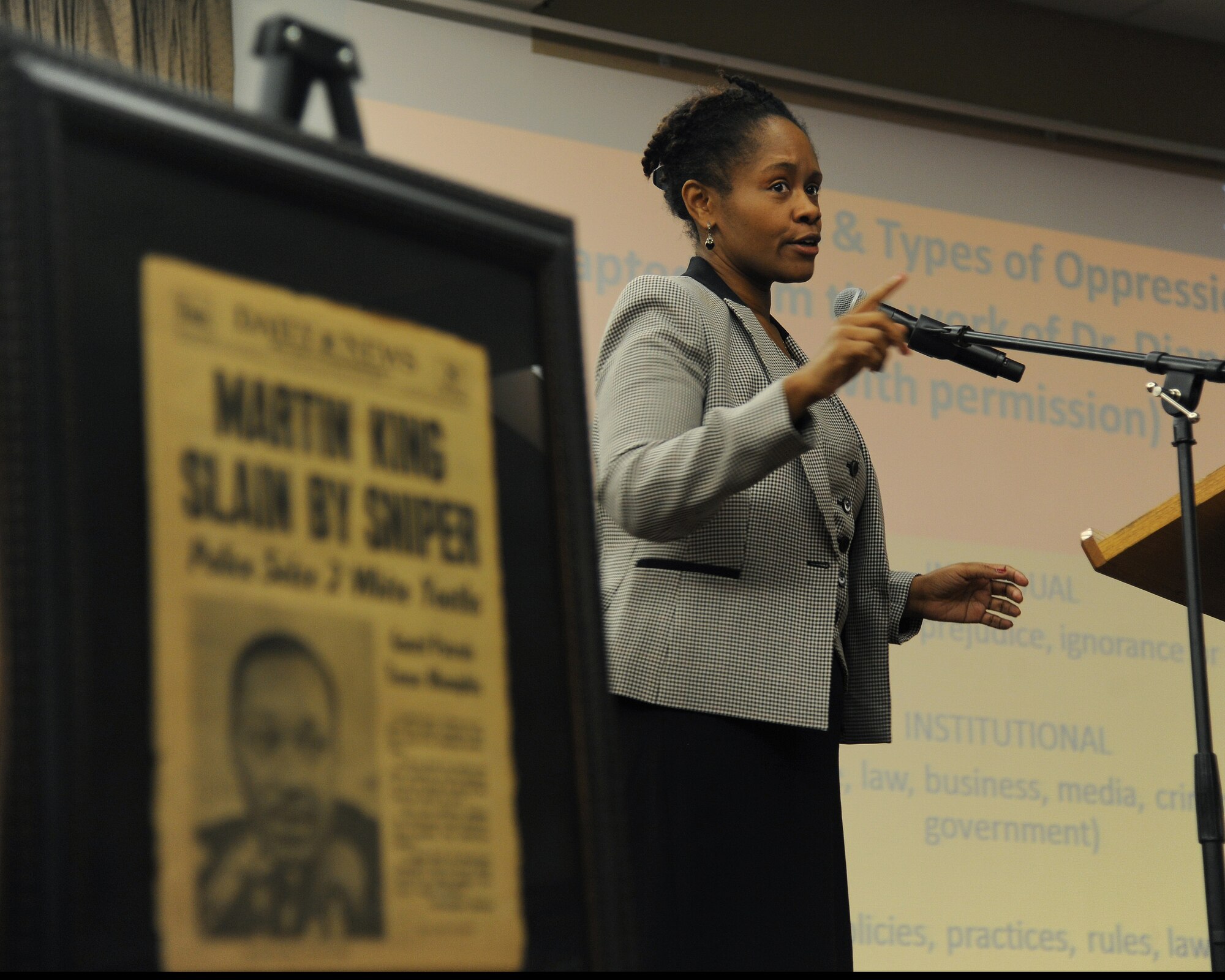 Dr. Malika Carter, CEO of Passion 4 Pivot, a performance improvement consulting firm, speaks about her view of what equality truly means Jan. 20, 2015, on Grand Forks Air Force Base, N.D. Carter was the guest speaker for the base’s Martin Luther King Jr. Luncheon. More than 50 attendees were present to hear Carter’s speech which revolved around the luncheon’s overall theme of, “working together for one common goal.” The entire event was funded by donations and volunteer work from numerous personnel on base. (U.S. Air Force photo/Senior Airman Zachiah Roberson)