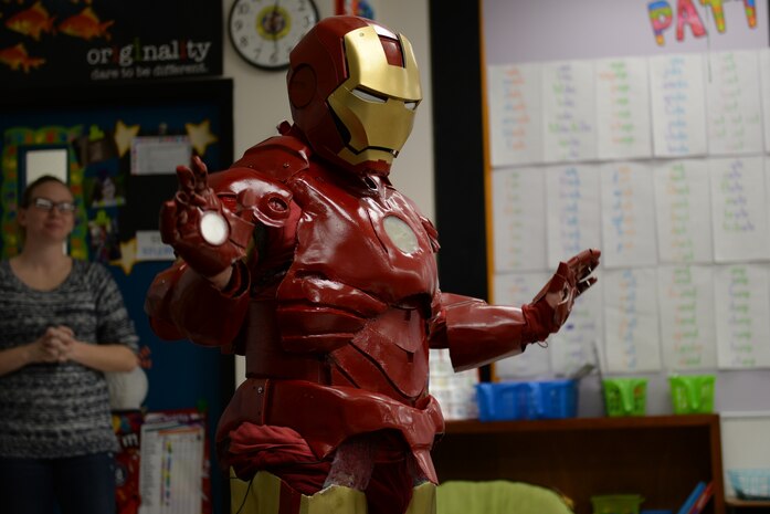 Tech. Sgt. Brian Thornton, 628th Air Base Wing Air Defense Council paralegal, in his homemade Iron Man suit visits classrooms at Marrington Elementary, Joint Base Charleston - Weapons Station, S.C. Dec. 8, 2014. Thornton wears his Iron Man suit at local schools and hospitals hoping to help brighten a child’s day. (U.S. Air Force photo/Senior Airman Christopher Reel)