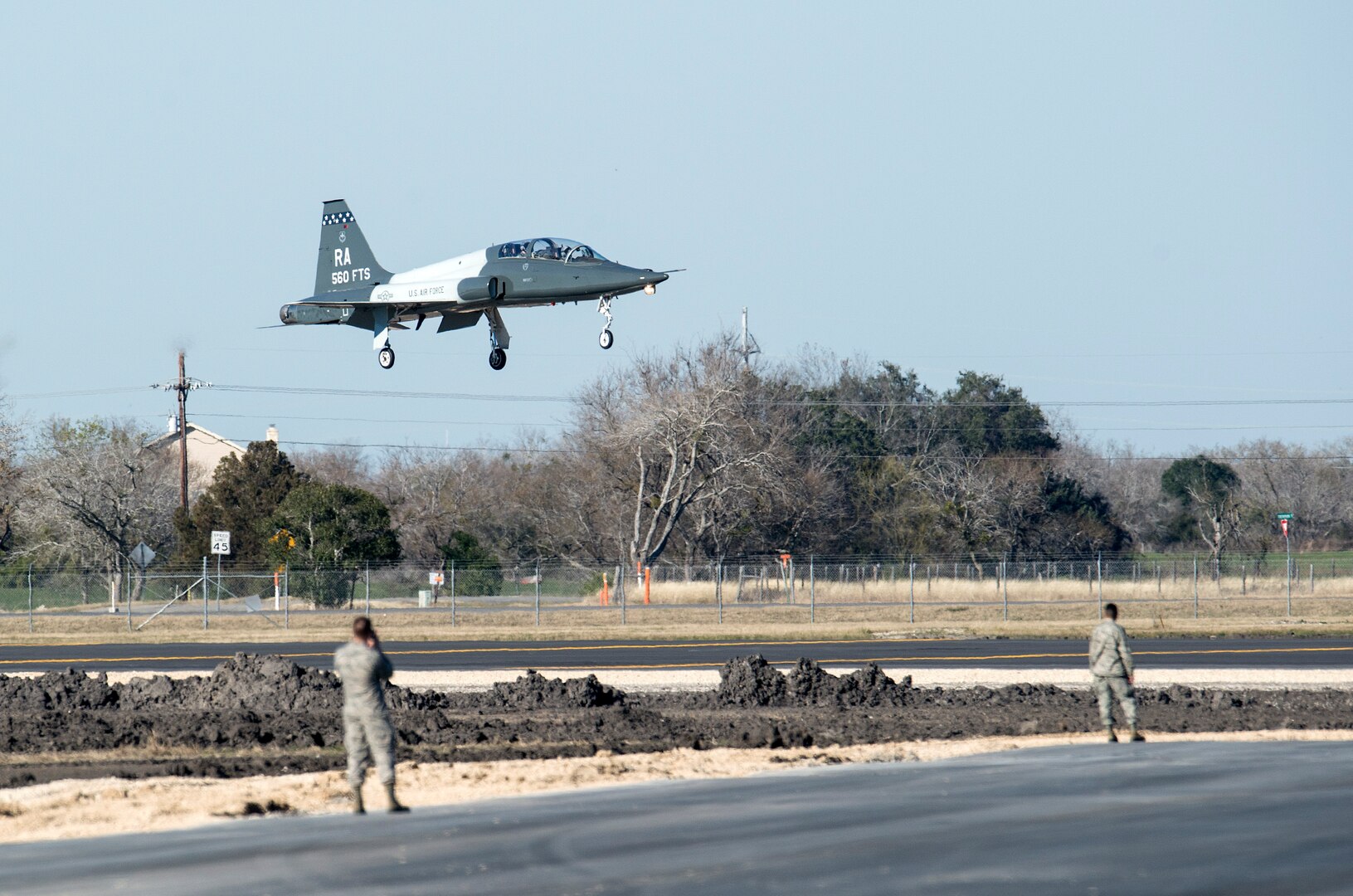 The first T-38C Talon lands at the Joint Base San Antonio-Randolph Seguin Auxiliary Airfield during a ribbon cutting event signifying the reopening of the JBSA-Randolph Seguin Auxiliary Airfield Jan. 20.  Upon completion of a three-year construction project, the airfield is now ready for flying by members of the 560th Flying Training Squadron.  The airfield is crucial for “touch and go” training that qualifies fighter and bomber pilots as instructor pilots in the T-38C Talon.  The reconstructed runway increases flight safety by distributing training around the San Antonio area, which means fewer aircraft and less congestion around Joint Base San Antonio-Randolph. (U.S. Air Force photo by Johnny Saldivar)