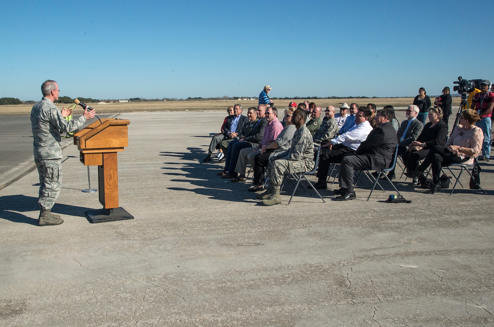 Brig. Gen. Bob LaBrutta, 502nd Air Base Wing and Joint Base San Antonio commander, addresses the crowd during a symbolic ribbon cutting event at Joint Base San Antonio-Randolph Seguin Auxiliary Airfield Jan. 20. The event signified the reopening of the airfield following a $12.4 million repaving and construction project that included replacing and grading the entire airfield, stabilizing existing soils, and constructing a new taxiway, parking apron and emergency access road.  (U.S. Air Force photo by Johnny Saldivar)