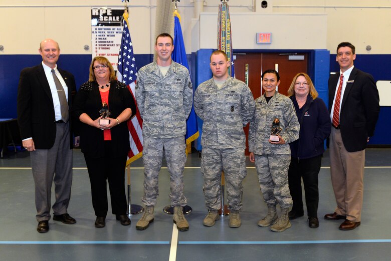 Winner of the 50th Space Wing Fourth Quarterly Awards pose for a photo Jan. 16, 2015, at Schriever Air Force Base, Colo. Col. Bill Liquori, 50 SW commander, also hosted his first commander’s call. (U.S. Air Force photo/Christopher DeWitt)