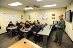 Col. David Drichta, 12th Operations Group commander, welcomes firefighters from the surrounding communities of Joint Base San Antonio-Randolph to aircraft familiarization training with JBSA-Randolph firefighters and aircraft maintainers Jan. 17.  Firefighters were invited to participate in hands-on training involving aircraft from JBSA-Randolph, to include the T-6 Texan II, T-1 Jayhawk and the T-38 Talon.  The partnership and working relationship between JBSA-Randolph firefighters and local civilian firefighters is critical in cases of emergency. (U.S. Air Force photo by Melissa Peterson)