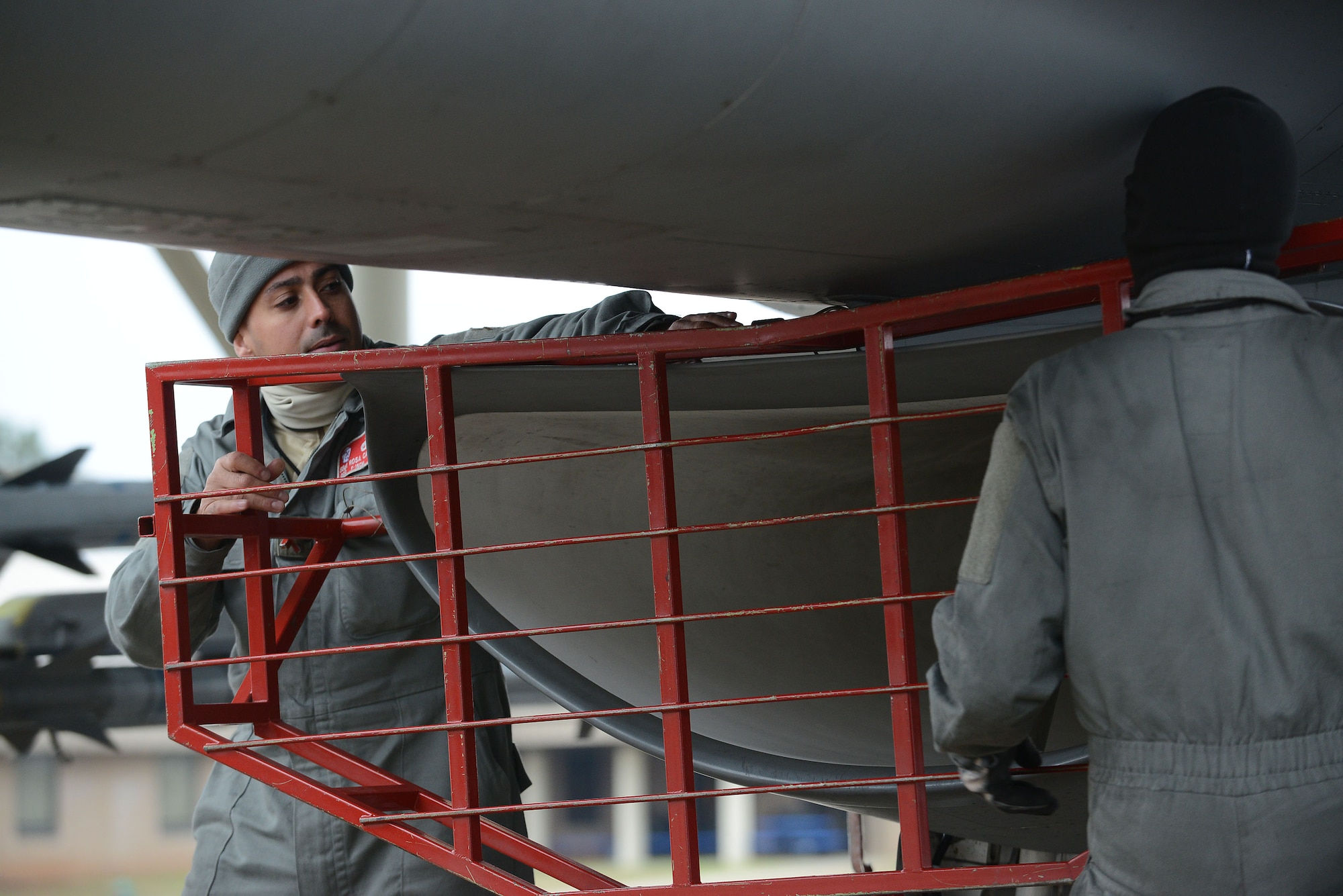 U.S. Air Force Airmen assigned to the 20th Aircraft Maintenance Squadron ensure an F-16CM Fighting Falcon is prepared for flight during a surge at Shaw Air Force Base, S.C., Jan. 13, 2015. Airmen worked together to maintain the aircraft during the five-day surge, keeping the 20th Fighter Wing fleet mission ready. (U.S. Air Force photo by Airman 1st Class Diana M. Cossaboom/Released)