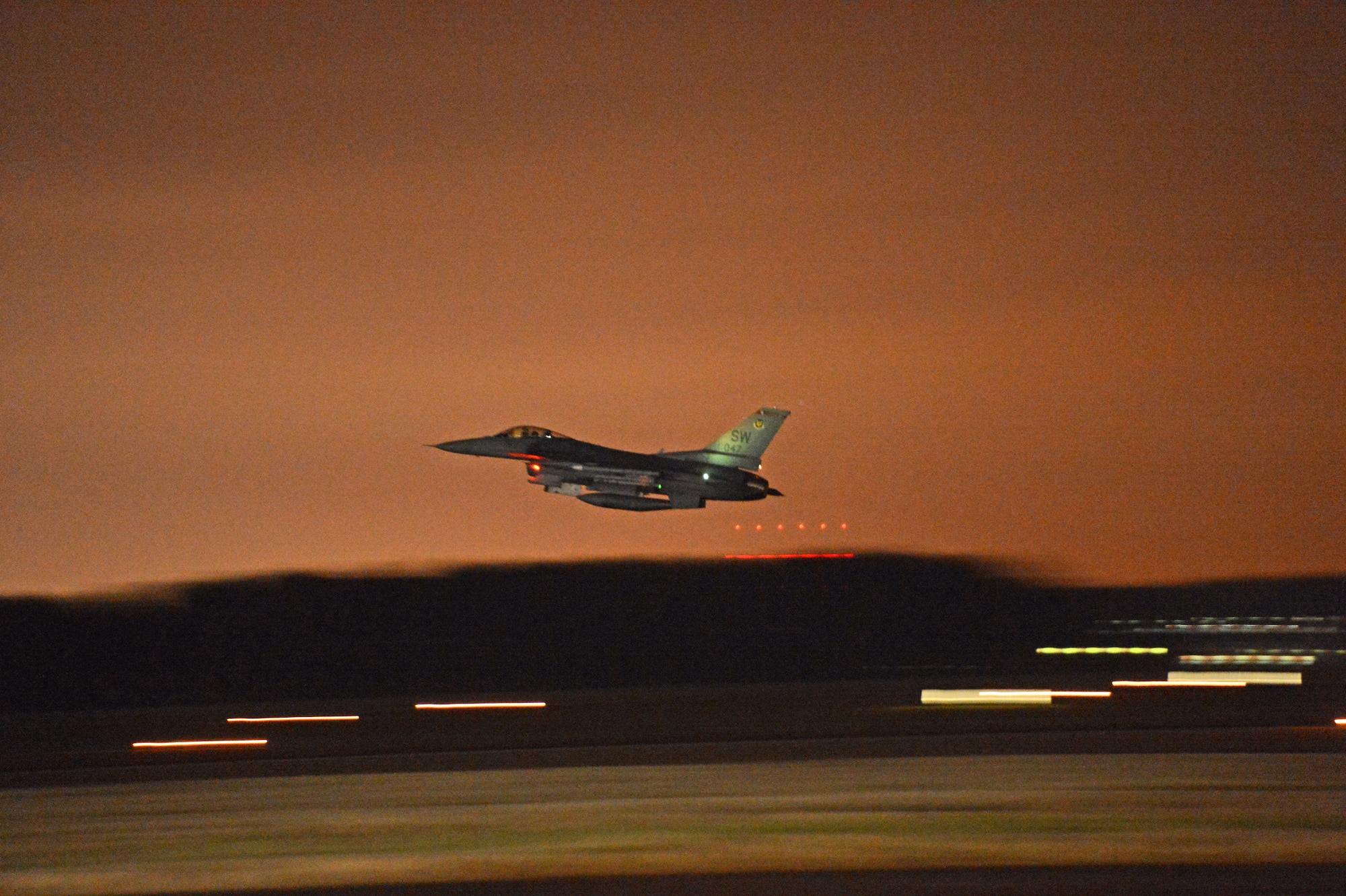 A U.S. Air Force F-16CM Fighting Falcon takes off at Shaw Air Force Base, S.C., Jan. 15, 2015. Pilots flew several day and night sorties as part of a five-day surge to keep the readiness and capability of the 20th Maintenance Group high. (U.S. Air Force photo by Senior Airman Jensen Stidham/Released)