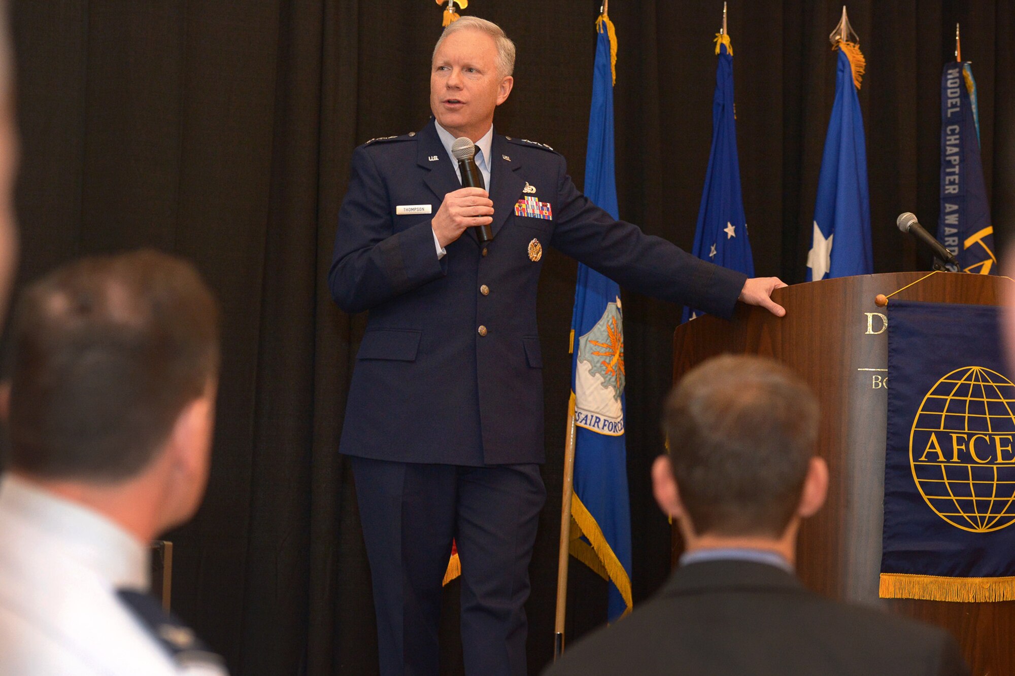 Lt. Gen. John Thompson, Air Force Life Cycle Management Center commander, speaks to the audience during his initial State of the Center address in Bedford, Mass., on Jan. 15. During the presentation, Thompson emphasized the criticality of the work LCMC performs, addressed topics ranging from strategic resource management and standardization to the new Air Force Inspection System. He also highlighted LCMC and Hanscom successes from the past year and presented his focus areas for 2015. (U.S. Air Force photo by Jerry Saslav)