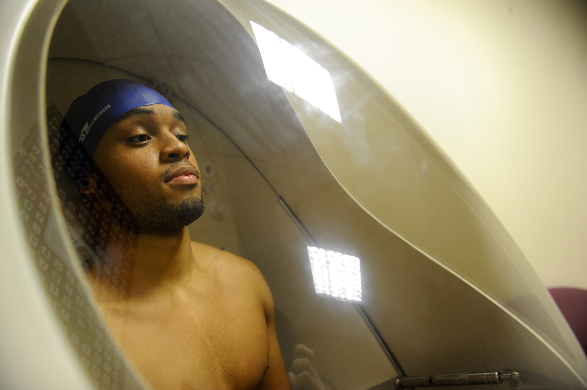 Airman First Class Brian Moorehead, 721st Aerial Port Squadron passenger service agent, uses a Bod Pod to measure his body composition at Health Promotion on Ramstein Air Base, Germany, Jan. 14, 2015. The machine measures an individual’s weight, body fat percent and change in body fat and muscle mass. The Bod Pod is available to all ID cardholders over the age of 18. (U.S. Air Force Photo/Airman 1st Class Michael Stuart)