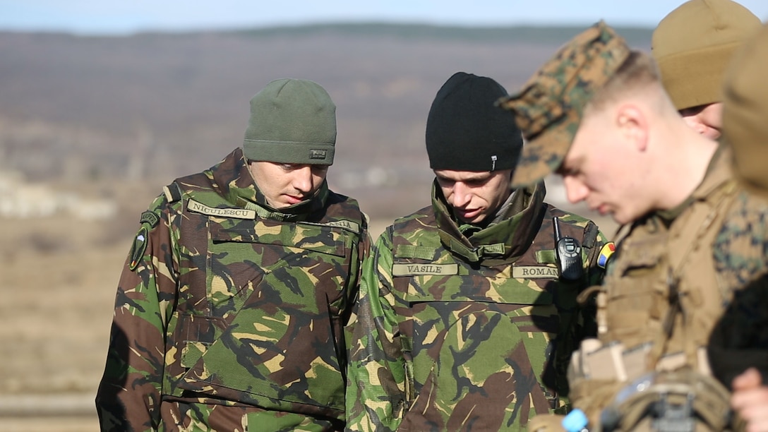 Black Sea Rotational Force Marines and Romanian soldiers paired together during Platinum Lion 15 Jan 15 at Novo Selo Training Area, Bulgaria. BSRF Marines trained with Serbian, Bulgarian and Romanian soldiers during the exercise. (U.S. Marine Corps photo by Cpl. Ryan Young/released)