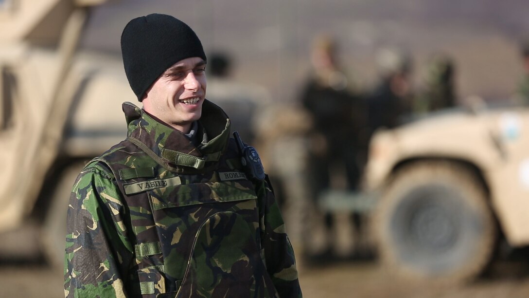 2nd Lt. Vasile Ionut from the Romanian Land Forces worked with Black Sea Rotational Force Marines during Platinum Lion 15 Jan 15 at Novo Selo Training Area, Bulgaria. BSRF Marines trained with Serbian, Bulgarian and Romanian soldiers during the exercise. (U.S. Marine Corps photo by Cpl. Ryan Young/released)