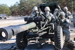 Soldiers from the New York Army National Guard's 1st Battalion, 258th Field Artillery conduct dry firing drills on their M119 howitzer during training at Fort Dix, N.J., Saturday, Jan. 10, 2015. The 373 members of the battalion, as well as fire support specialists from other New York Army National Guard units conducted training to prepare for live fire exercises in May.