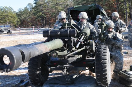 Soldiers from the New York Army National Guard's 1st Battalion, 258th Field Artillery conduct dry firing drills on their M119 howitzer during training at Fort Dix, N.J., Saturday, Jan. 10, 2015. The 373 members of the battalion, as well as fire support specialists from other New York Army National Guard units conducted training to prepare for live fire exercises in May.