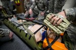 An Army Reserve medic uses a bag valve mask to pump air into a manikin in a training scenario during an 18-day Sapper Advanced Tactical Medical Course taught by the 321st Engineer Battalion at Gowen Field Air National Guard Base, Idaho, in January, 2015.