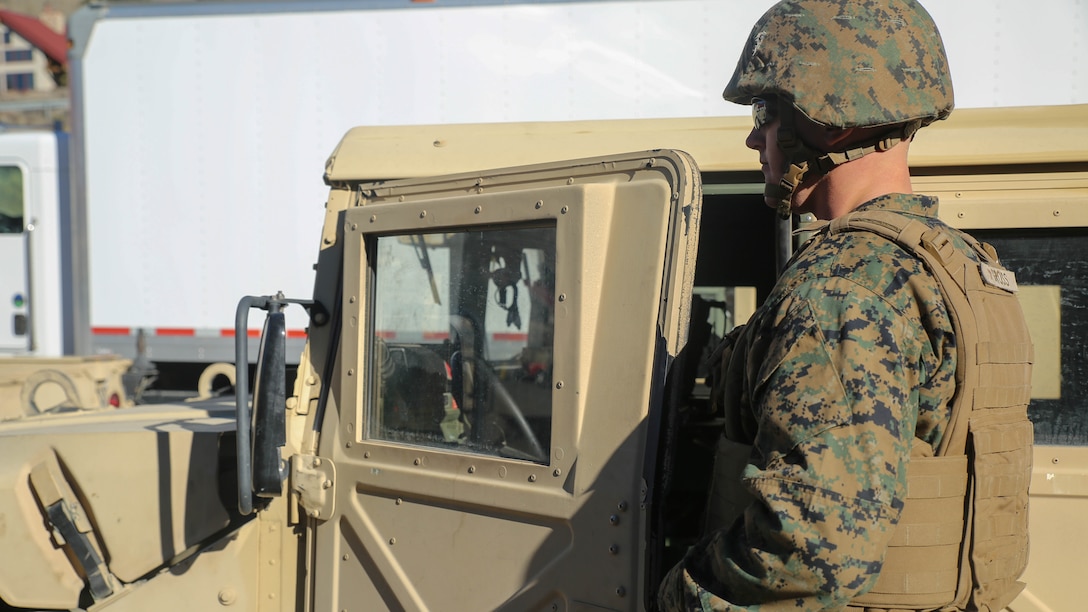 Lance Cpl. Brady Gross, a motor transportation operator with Combat Logistics Battalion 26, Headquarters Regiment, 2nd Marine Logistics Group, prepares for a convoy in the trails throughout the hills aboard Bridgeport, California, Jan. 14, 2015. The Marines practiced driving in the unfamiliar terrain to become better acquainted with the mountains they face in upcoming training. 