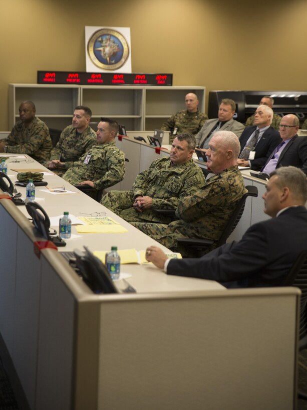 Lt. Gen. Richard P. Mills (second from the right), commander of Marine Force Reserve, and Adm. Bill E. Gortney( third from the right), commander of U.S. Northern Command and North American Aerospace Defense Command, attend a meeting at Marine Corps Support Facility New Orleans, Jan. 21, 2015. Gortney met with Mills to discuss future plans for the Marine Corps and Navy. 