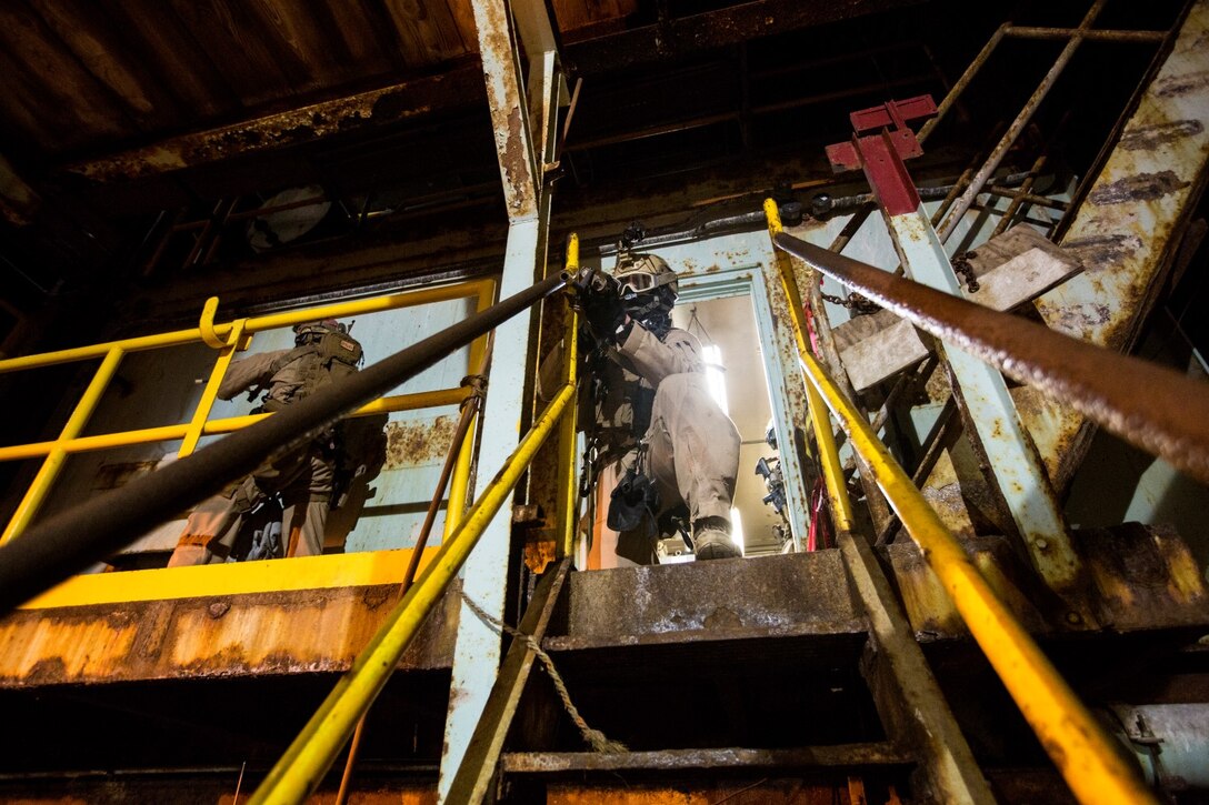 U.S. Marines with the 15th Marine Expeditionary Unit's Maritime Raid Force provide security during maritime interoperability training off the coast of Santa Barbara, Calif., Jan. 16, 2015. MIT prepares the MRF for their upcoming deployment by enhancing their combat skills, and teaching them techniques for boarding vessels. (U.S. Marine Corps photo by Sgt. Jamean Berry/Released)