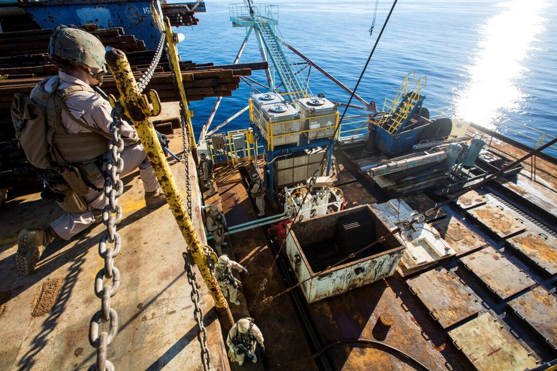 U.S. Marines with the 15th Marine Expeditionary Unit's Maritime Raid Force clear a gas and oil platform during maritime interoperability training off the coast of Santa Barbara, Calif., Jan. 16, 2015. MIT prepares the MRF for their upcoming deployment by enhancing their combat skills and teaching them techniques for boarding vessels. (U.S. Marine Corps photo by Sgt. Jamean Berry/Released)