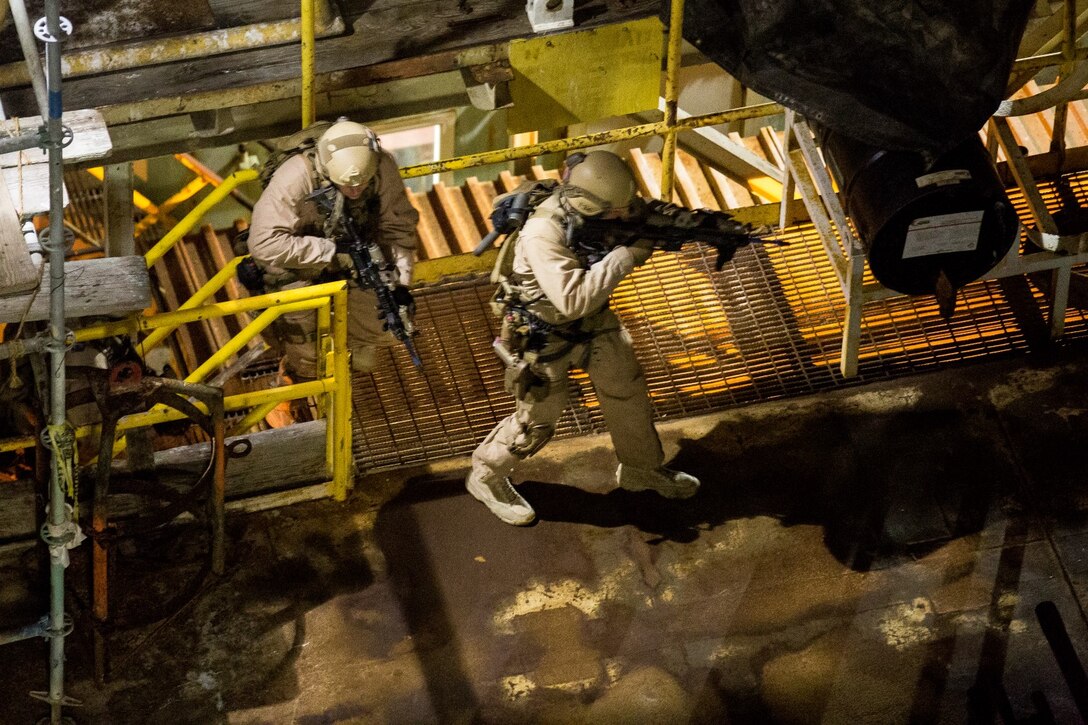 U.S. Marines with the 15th Marine Expeditionary Unit's Maritime Raid Force clear a gas and oil platform during maritime interoperability training off the coast of Santa Barbara, Calif., Jan. 16, 2015. MIT prepares the MRF for their upcoming deployment by enhancing their combat skills, and teaching them techniques for boarding vessels. (U.S. Marine Corps photo by Sgt. Jamean Berry/Released)