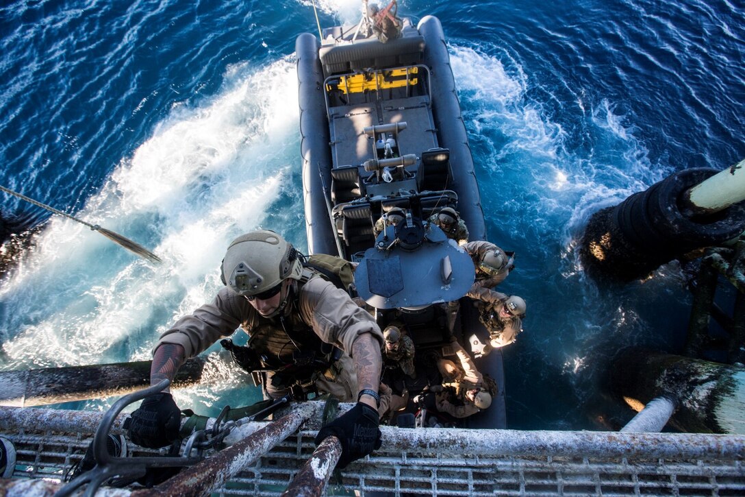 U.S. Marines with the 15th Marine Expeditionary Unit's Maritime Raid Force board a gas and oil platform during maritime interoperability training off the coast of Santa Barbara, Calif., Jan. 16, 2015. MIT prepares the MRF for their upcoming deployment by enhancing their combat skills, and teaching them techniques for boarding vessels. (U.S. Marine Corps photo by Sgt. Jamean Berry/ Released)