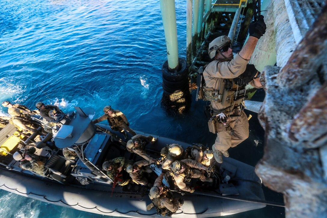 U.S. Marines with the 15th Marine Expeditionary Unit's Maritime Raid Force board a gas and oil platform during maritime interoperability training off the coast of Santa Barbara, Calif., Jan. 16, 2015. MIT prepares the MRF for their upcoming deployment by enhancing their combat skills, and teaching them techniques for boarding vessels. (U.S. Marine Corps photo by Sgt. Jamean Berry/Released)