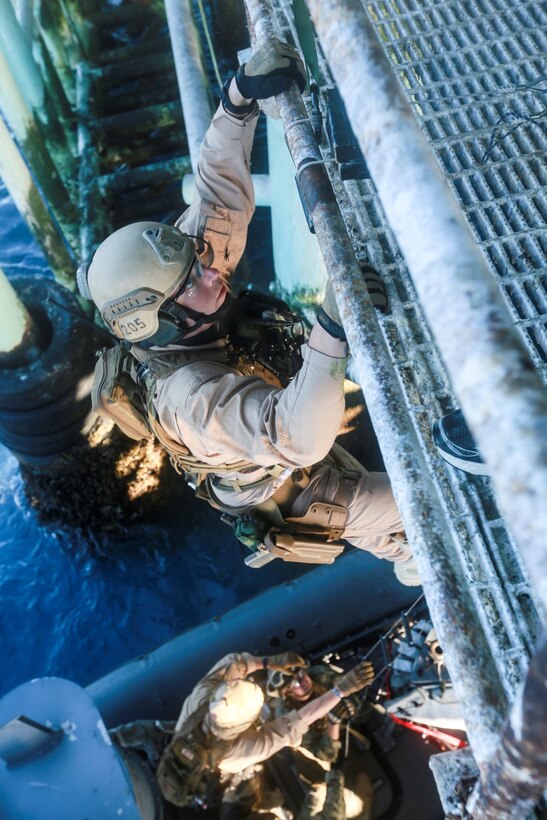 U.S. Marines with the 15th Marine Expeditionary Unit's Maritime Raid Force board a gas and oil platform during maritime interoperability training off the coast of Santa Barbara, Calif., Jan. 16, 2015. MIT prepares the MRF for their upcoming deployment by enhancing their combat skills, and teaching them techniques for boarding vessels. (U.S. Marine Corps photo by Sgt. Jamean Berry/Released)