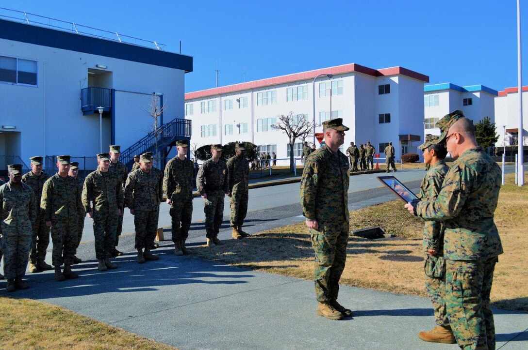 4 January 2015, CATC Camp Fuji, Gotemba, Japan - Sergeant James (PMO, CATC Camp Fuji) is promoted to Staff Sergeant by Major Marshall and Sergeant Major Slattery.