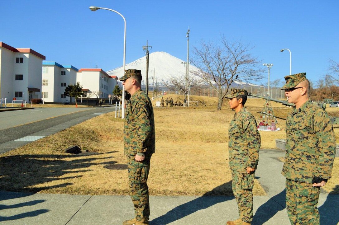 4 January 2015, CATC Camp Fuji, Gotemba, Japan - Sergeant James (PMO, CATC Camp Fuji) is promoted to Staff Sergeant by Major Marshall and Sergeant Major Slattery.