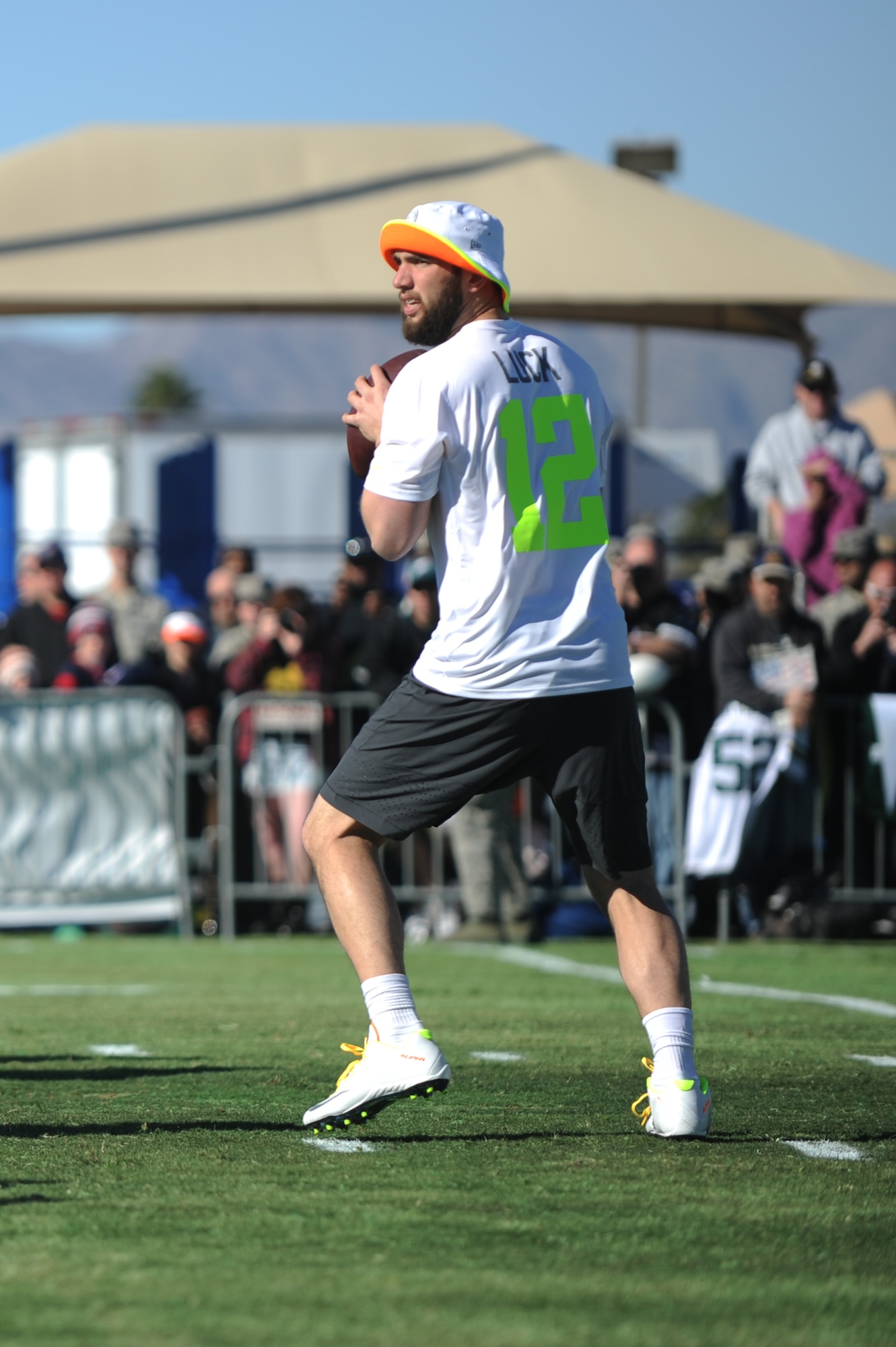 Andrew Luck, Indianapolis Colts quarterback assigned to Pro Bowl Team Carter, drops back to pass during a practice game at Luke Air Force Base, Arizona, Jan. 22, 2015. The Pro Bowl players were practicing on base to show support for Airmen and to prepare for the game on Sunday. (U.S. Air Force photo by Staff Sgt. Staci Miller)