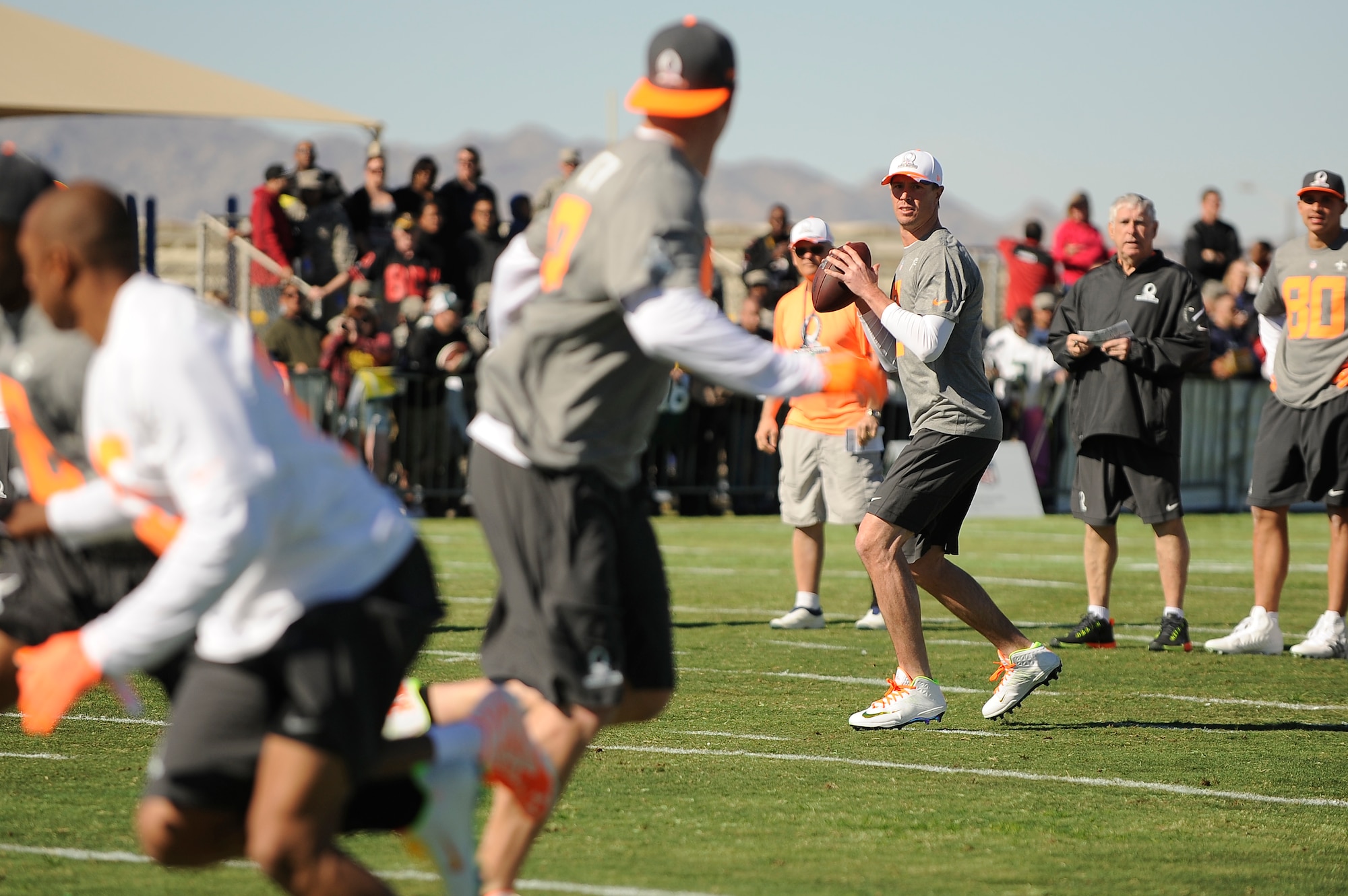Matt Ryan, Atlanta Falcons quarterback assigned to Pro Bowl Team Irvin, drops back to pass during a practice game at Luke Air Force Base, Arizona, Jan. 22, 2015. The Pro Bowl players were practicing on base to show support for Airmen and to prepare for the game on Sunday. (U.S. Air Force photo by Staff Sgt. Staci Miller)