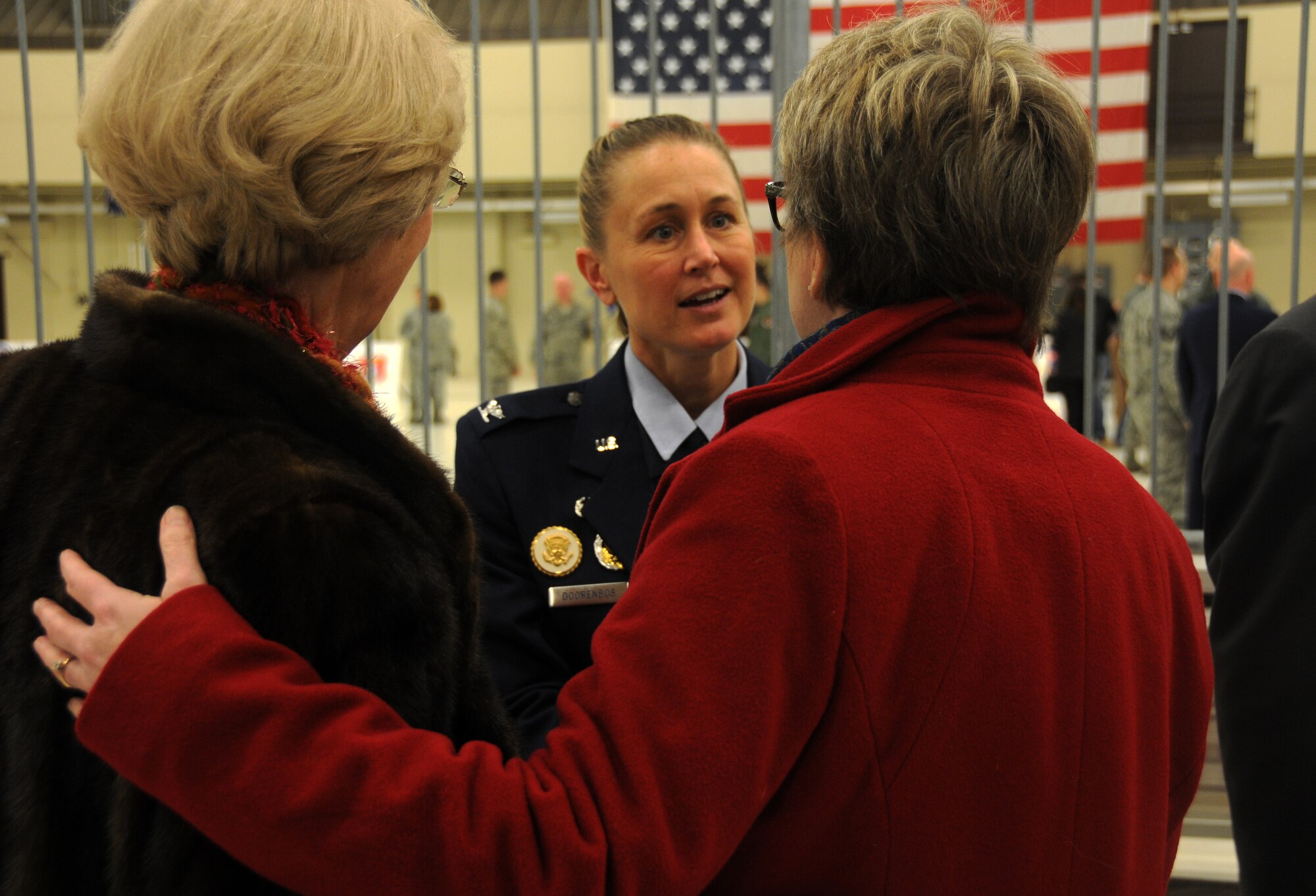 Col. Bobbi Doorenbos, 188th Wing commander, visits with members of the local community following a wing change of command ceremony held at Ebbing Air National Guard Base, Fort Smith, Ark., Jan. 11, 2015. Doorenbos, former commander of the 214th Reconnaissance Group, took command of the 188th Wing from Col. Mark Anderson during the ceremony. (U.S. Air National Guard photo by Airman 1st Class Cody Martin/released) 