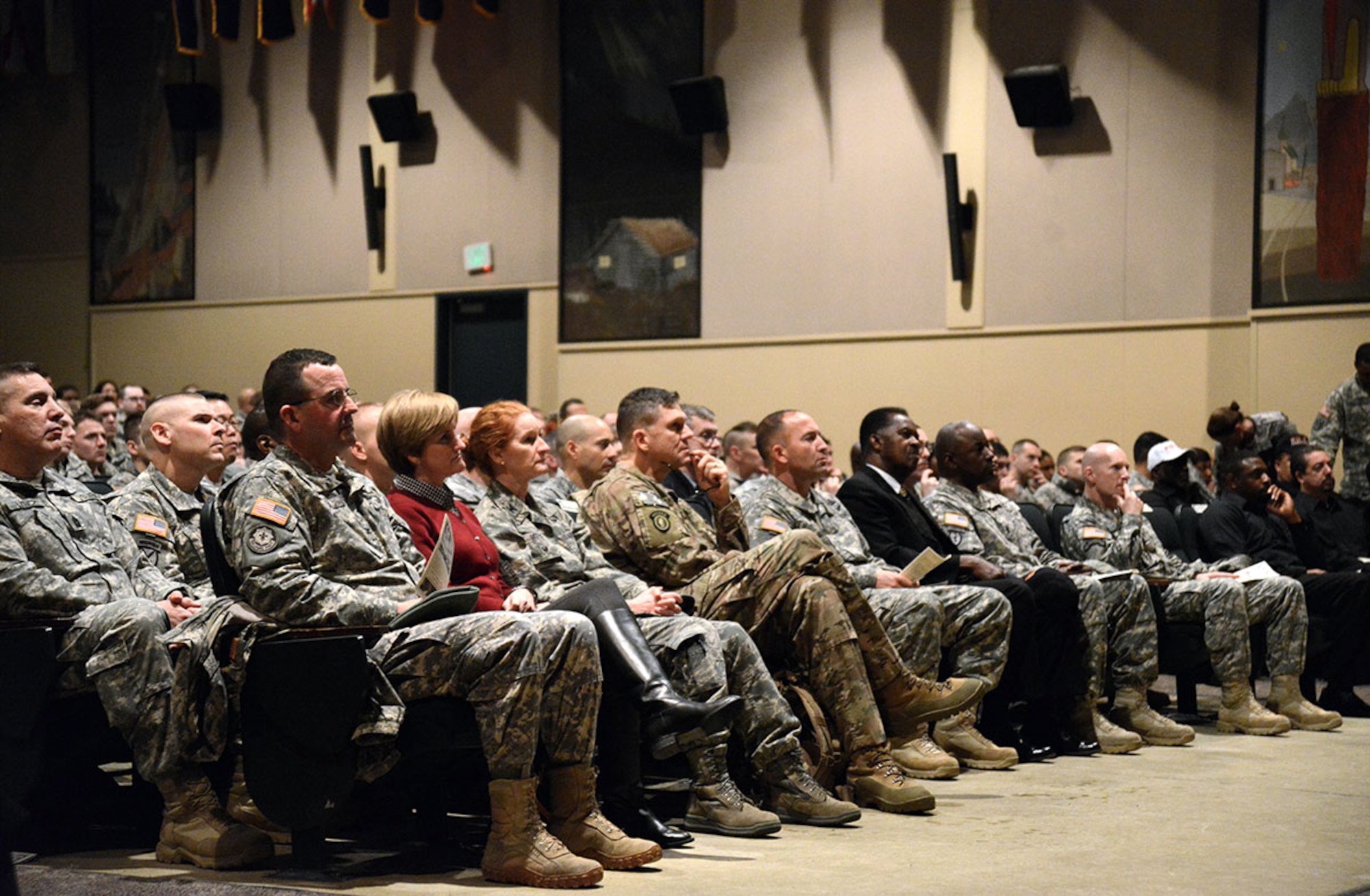 Attendees give their attention to guest speaker Rev. Alonzo Patterson Jr. during the Martin Luther King Jr. Day observance in the Frontier theater on JBER-Richardson, Jan. 15. (U.S. Air Force photo/Amn Christopher R. Morales)