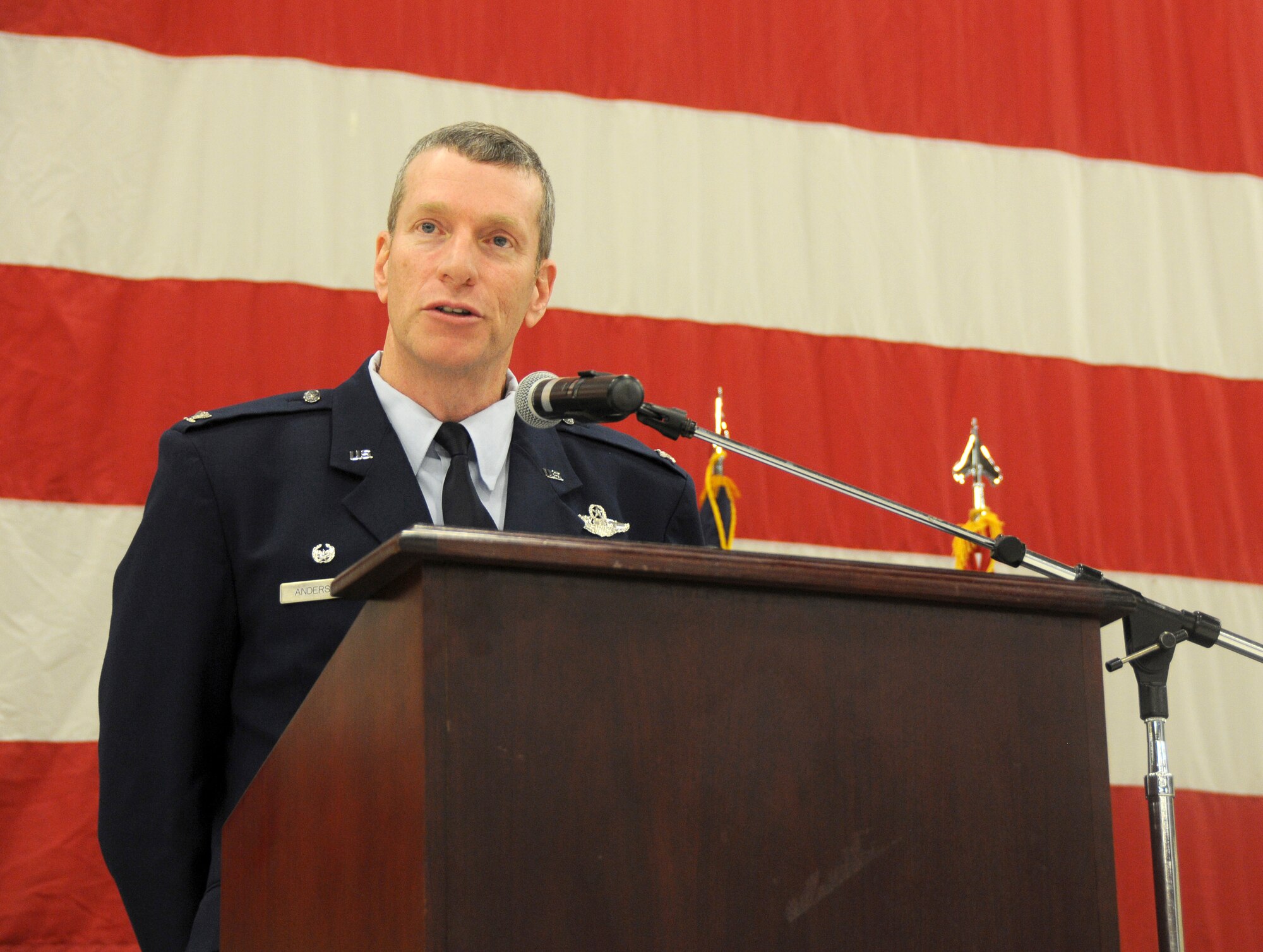 Col. Mark Anderson delivers a speech during a wing change of command ceremony Jan. 11 at Ebbing Air National Guard Base, Fort Smith, Ark. Anderson relinquished command of the 188th Wing to Col. Bobbi Doorenbos during the ceremony. (U.S. Air National Guard photo by Airman 1st Class Cody Martin/released)