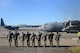 Dobbins Air Reserve Base leadership salutes the second aircrew as the 94th Airlift Wing Hercules begins to taxi out for takeoff to Southwest Asia, at Dobbins Air Reserve Base, Ga., Jan. 8, 2015. (U.S. Air Force photo/Brad Fallin)