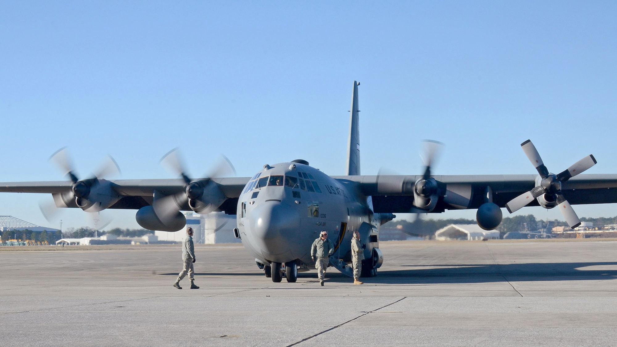 94th Airlift Wing maintenance personnel stand by to monitor the last engine start for the C-130H aircraft. The aircraft and crew are leaving for deployment to Southwest Asia, Jan. 8, 2015 at Dobbins Air Reserve Base, Ga.  (U.S. Air Force photo/Brad Fallin)