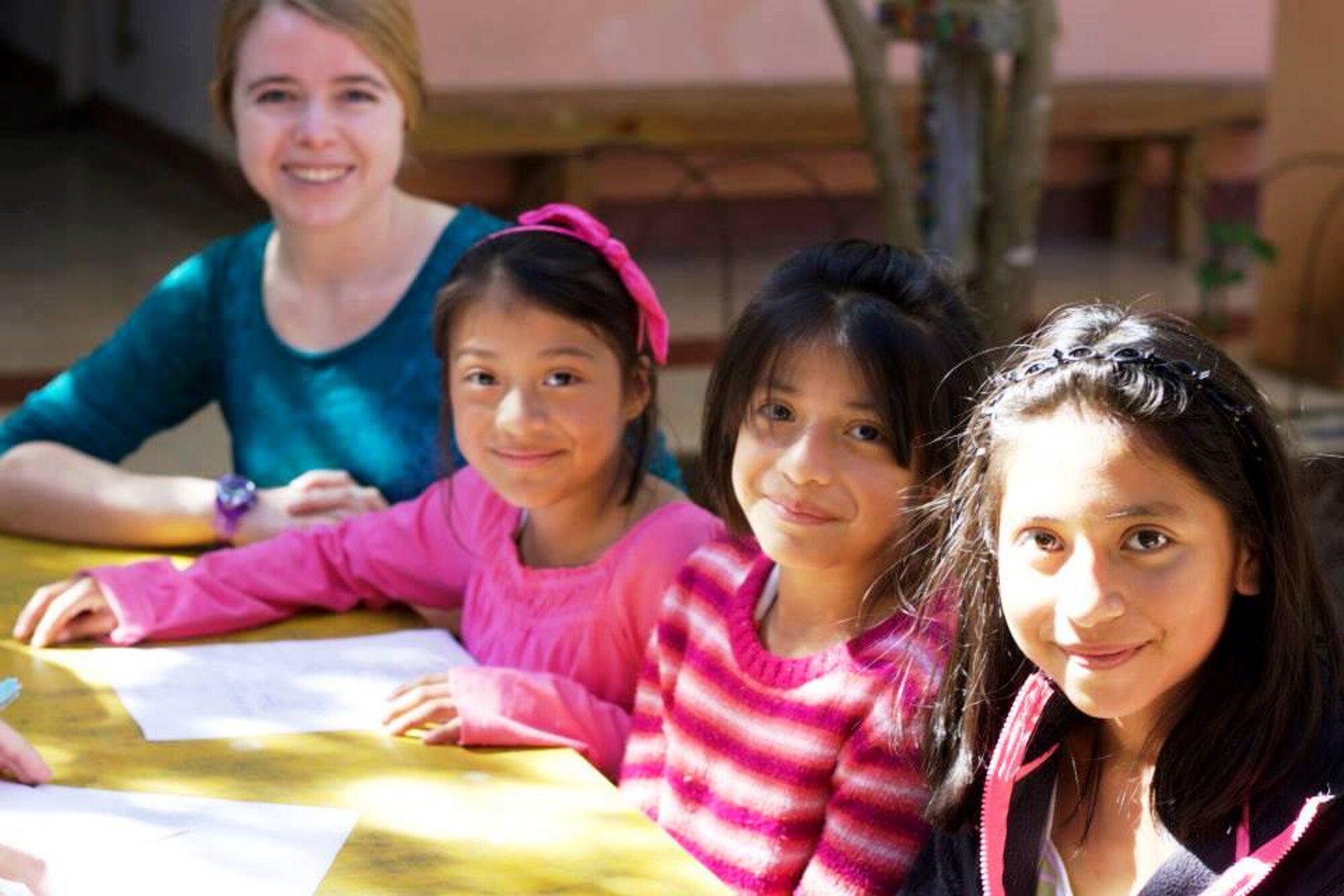 Liesl Lawrence (background) a volunteer with T.I.M.E. for Christ Medical Ministries helps out in the children's ministry in the little town of San Raimundo Guatemala. (Courtesy photo/Cheryl Chrisman)

