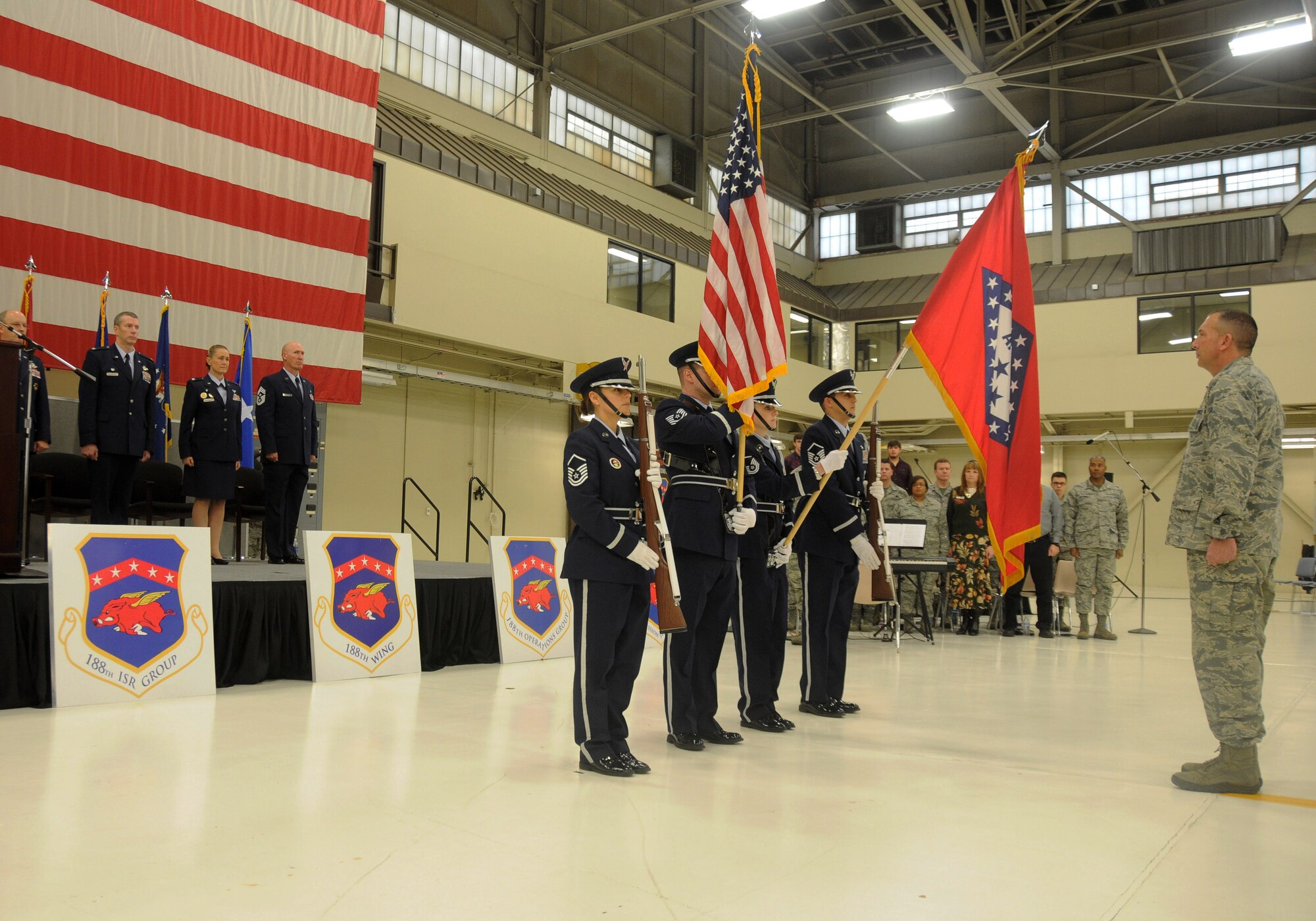From left: Master Sgt. Jean Schnauffer, Tech Sgt. Robert Stephens, Master Sgt. Lindsey Mott and Master Sgt. Michael Aponte, all members 188th Wing Honor Guard, perform during a wing change of command ceremony Jan. 11 at Ebbing Air National Guard Base, Fort Smith, Ark. Col. Mark Anderson relinquished command of the 188th to Col. Bobbi Doorenbos during the ceremony. (U.S. Air National Guard photo by Airman 1st Class Cody Martin/released)