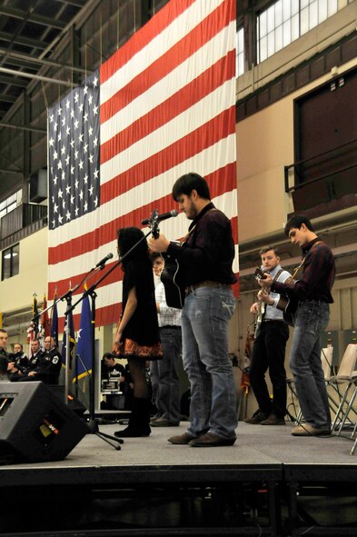 Members of the Junior Wing Ensemble perform a patriotic medley during a wing change of command ceremony Jan. 11 at Ebbing Air National Guard Base, Fort Smith, Ark. Col. Mark Anderson relinquished command of the 188th to Col. Bobbi Doorenbos during the ceremony. (U.S. Air National Guard photo by Staff Sgt. John Suleski/released)