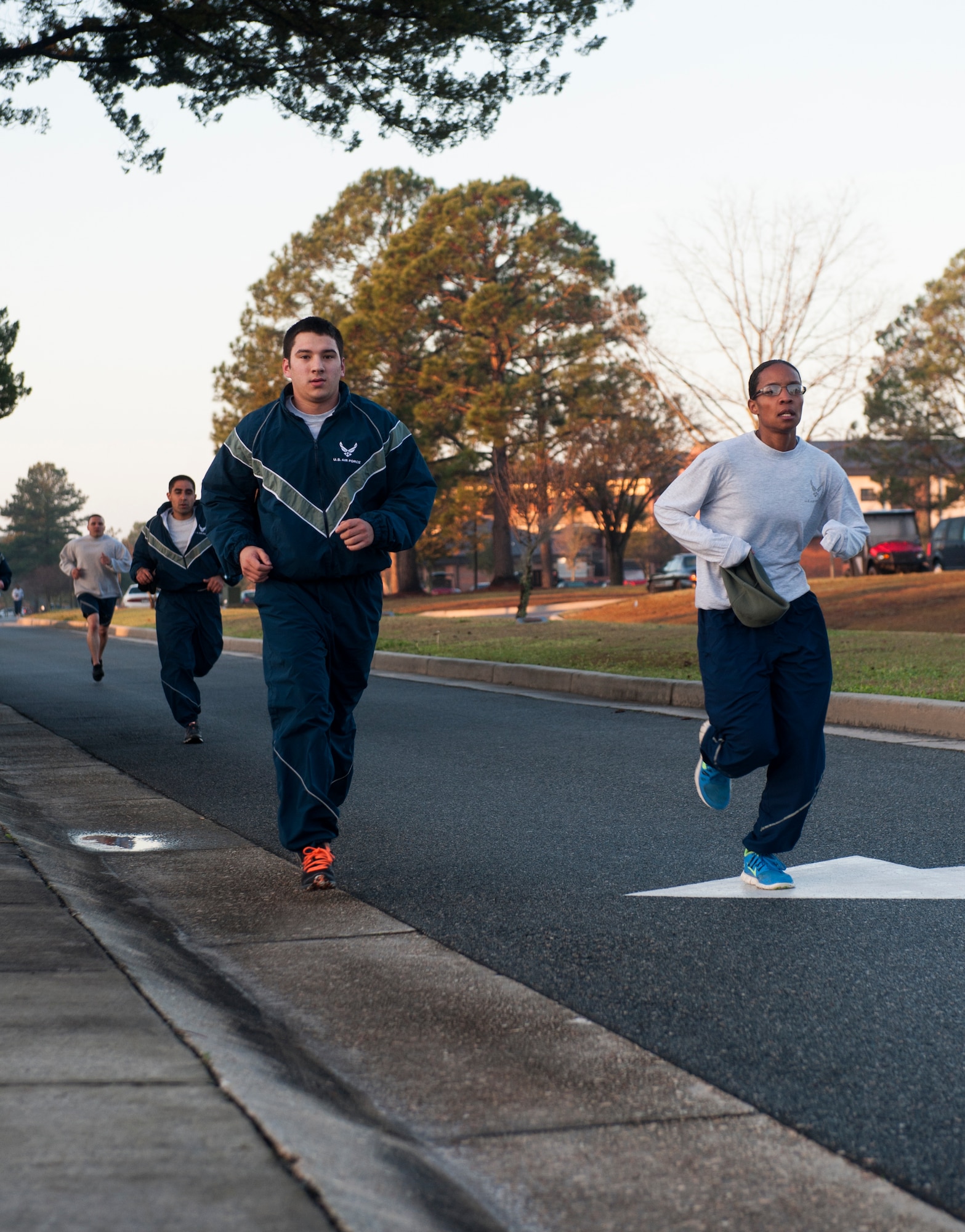 Airmen approach the finish line of a Martin Luther King Jr. Day memorial march/5k run Jan. 16, 2015, at Moody Air Force Base, Ga. After a symbolic one mile march, participants had the opportunity to run the remaining distance of the 5k. (U.S. Air Force photo by Senior Airman Jarrod Grammel/Released)
